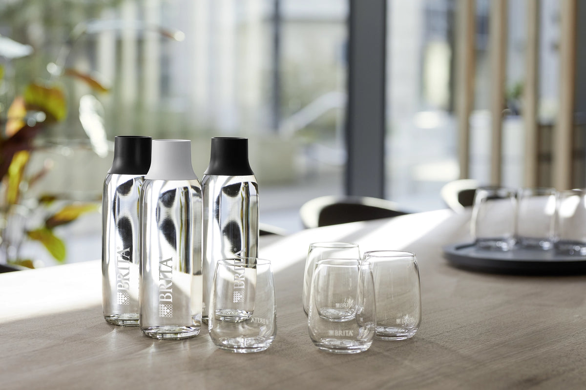 BRITA Wave bottles and glasses on a table in a meeting room