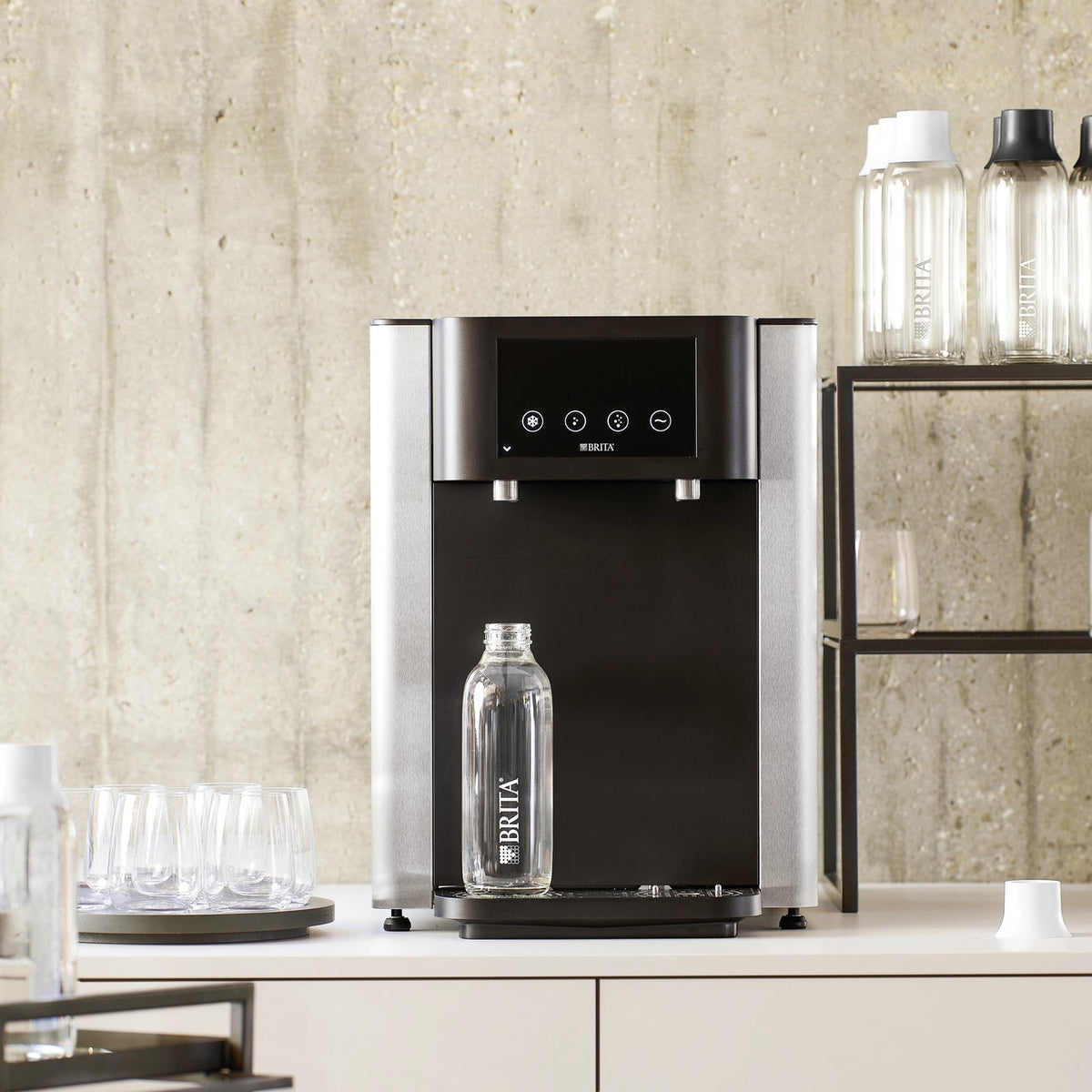 Fill Pro water dispenser on a kitchen counter with a Wave Bottle standing underneath.